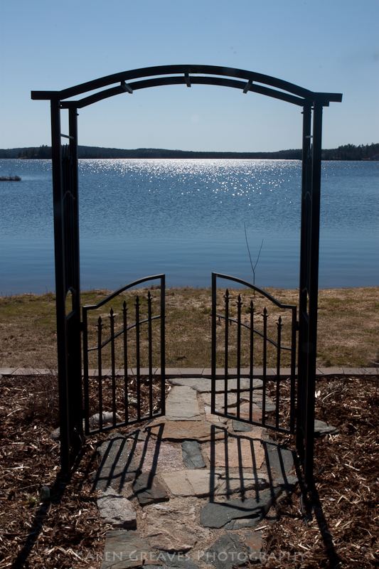 garden arbor with view of lake