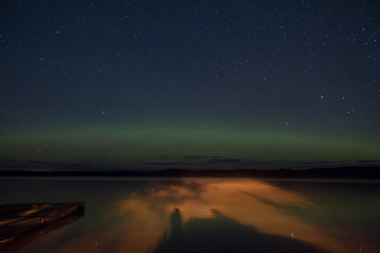 shadows in the mist on the lake